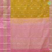 Mustard yellow gold zari checks and butta design onion pink gold zari multi design lines border art silk saree