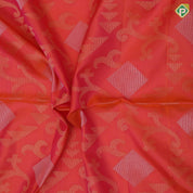Pinkish orange silver gold zari diamond geometrical design self gold zari lines border soft silk saree