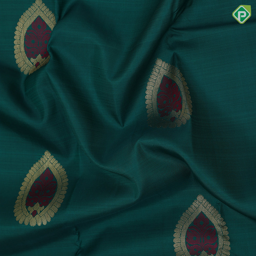 sapphire green gold zari thread meena work thilagam butta gold zari tissue bavanji border traditional Navratri special silk saree