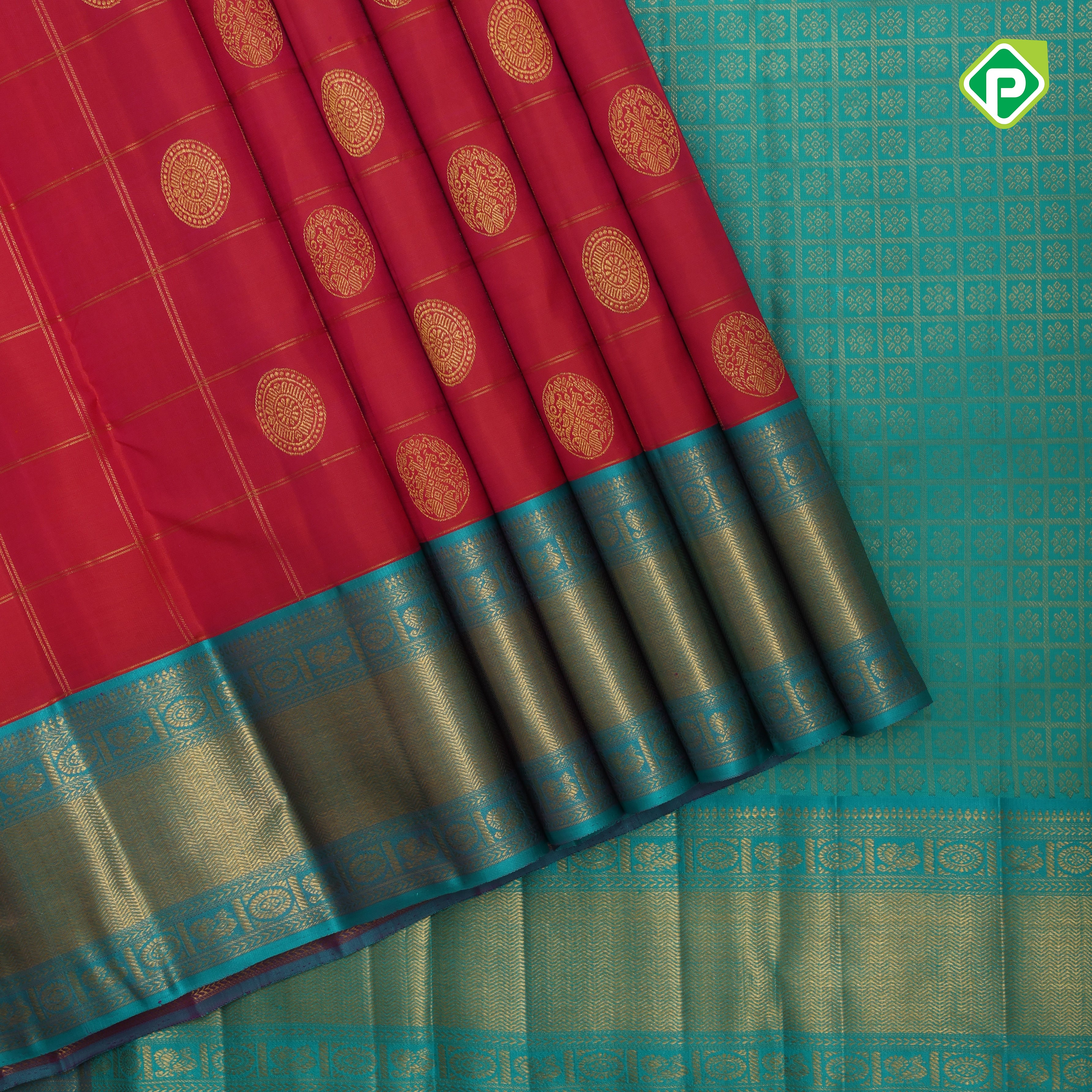tomato red gold zari checked self design round butta contrast rexona green gold zari border traditional silk saree