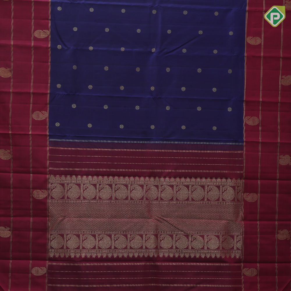Royal blue gold zari chakkaram butta design maroon mango and peacock zari lines green edge border traditional silk saree