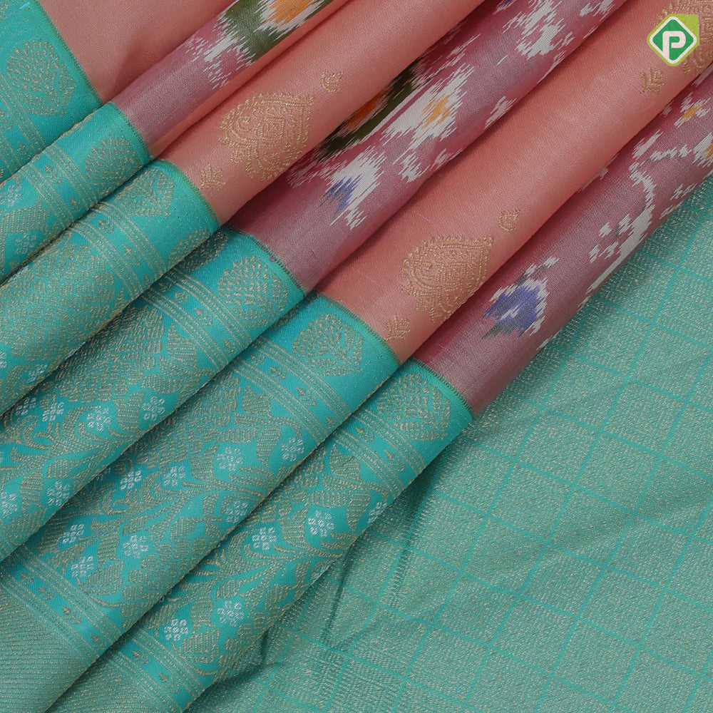 Peach base gold zari heart butta and ikkat design rexona green gold zari floral korvai border fusion silk saree