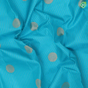 Turquoise color gold zari stripes and chakkaram butta self gold zari edge border gift silk saree