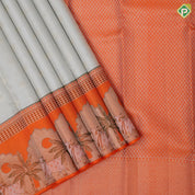 Greyish white silver zari checks and butta motifs contrast orange silver zari village effect pichwai border silk saree