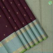 Dark Maroon Gold Zari Small Flower Motif Design Light Green Rettapet Mayilkan Border Design Traditional Silk Saree