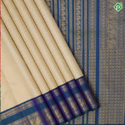 creamy sandal gold zari velthari and checks design peacock blue gold zari peacock butta retta pett border traditional silk saree