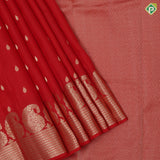 Sendoram red gold zari small thilagam butta self gold zari zig zag and mango border traditional silk saree