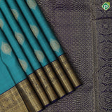 Teal green silver and gold zari double parrot round butta purple blue gold zari yaali butta border traditional silk saree