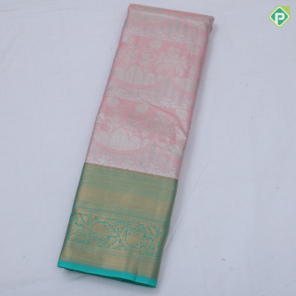 Pink silver zari fancy flower and arch design rama green gold zari rangoli border tissue art silk saree
