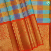 Multi color checks gold zari checks and gaja yaali butta orange with gold zari double design border tissue pattu paavadai