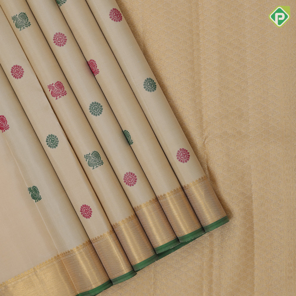 Sandal and multi color silk thread peacock chakkaram butta self gold zari and green edge border traditional silk saree