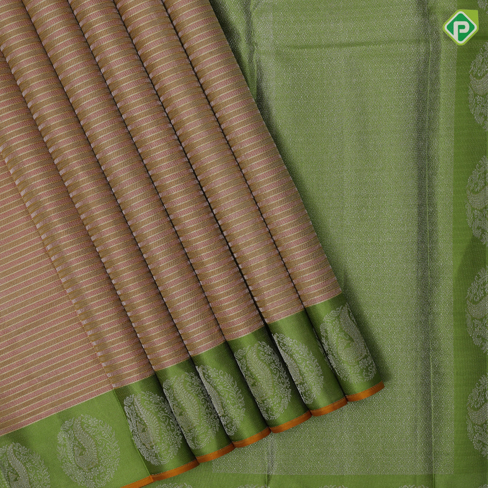 cream colour shades with silver gold zari thread work lines contrast leaf green silver gold zari fancy annam butta border traditional silk saree