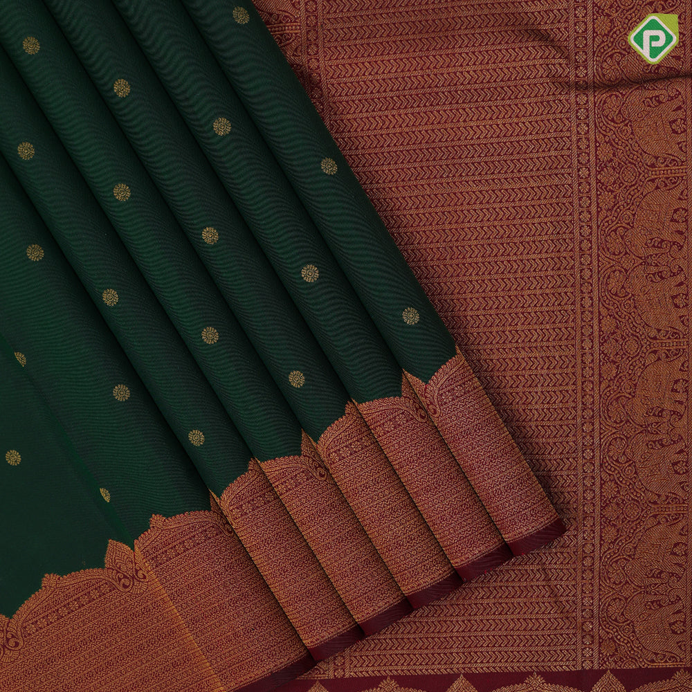 Dark green gold zari rudraksham butta design maroon gold zari velthari lines turning border traditional silk saree