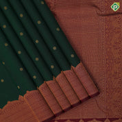 Dark green gold zari rudraksham butta design maroon gold zari velthari lines turning border traditional silk saree