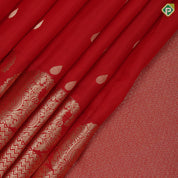 Sendoram red gold zari small thilagam butta self gold zari zig zag and mango border traditional silk saree