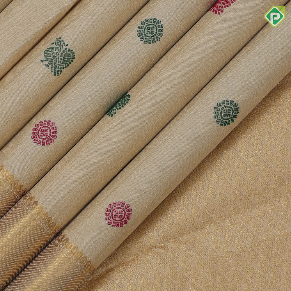 Sandal and multi color silk thread peacock chakkaram butta self gold zari and green edge border traditional silk saree