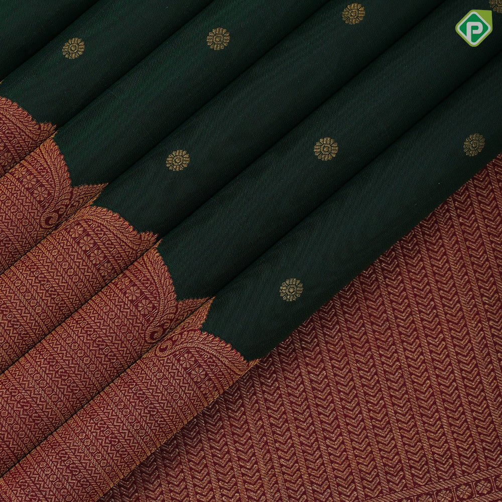 Dark green gold zari rudraksham butta design maroon gold zari velthari lines turning border traditional silk saree