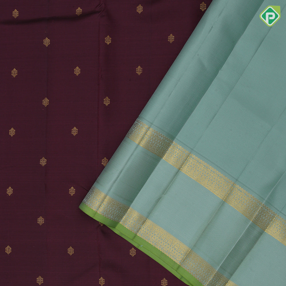 Dark Maroon Gold Zari Small Flower Motif Design Light Green Rettapet Mayilkan Border Design Traditional Silk Saree