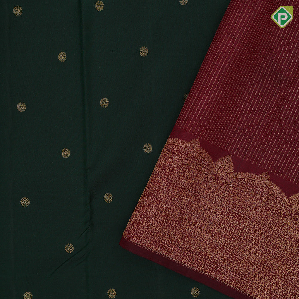 Dark green gold zari rudraksham butta design maroon gold zari velthari lines turning border traditional silk saree