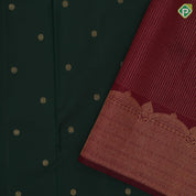 Dark green gold zari rudraksham butta design maroon gold zari velthari lines turning border traditional silk saree