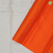 Greyish white silver zari checks and butta motifs contrast orange silver zari village effect pichwai border silk saree