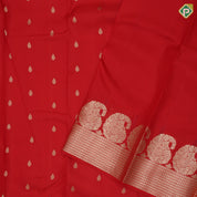 Sendoram red gold zari small thilagam butta self gold zari zig zag and mango border traditional silk saree