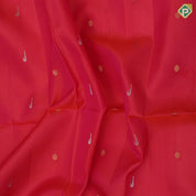 reddish pink hocky stick and ball design rani pink silver gold zari wave and rangoli border soft silk saree