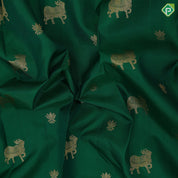 Green with gold zari cow and lotus butta design reddish pink silver gold zari cow and lotus lines border traditional silk saree