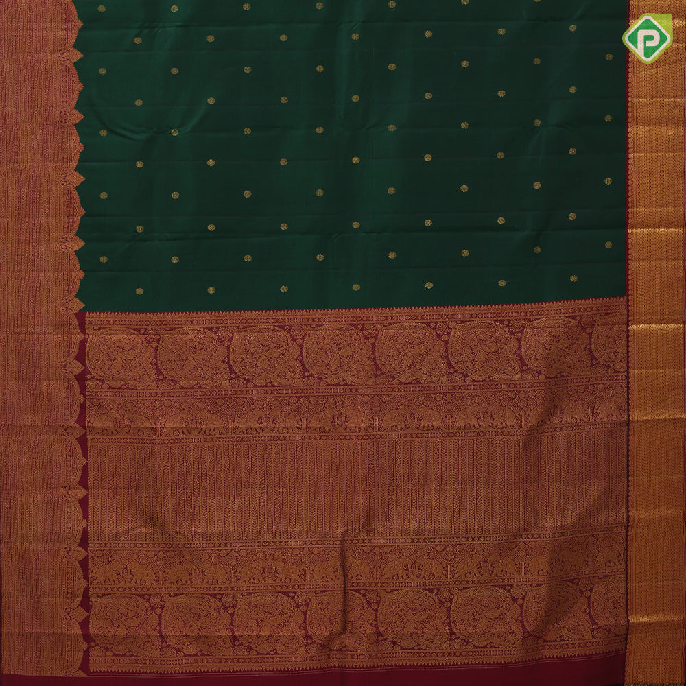 Dark green gold zari rudraksham butta design maroon gold zari velthari lines turning border traditional silk saree