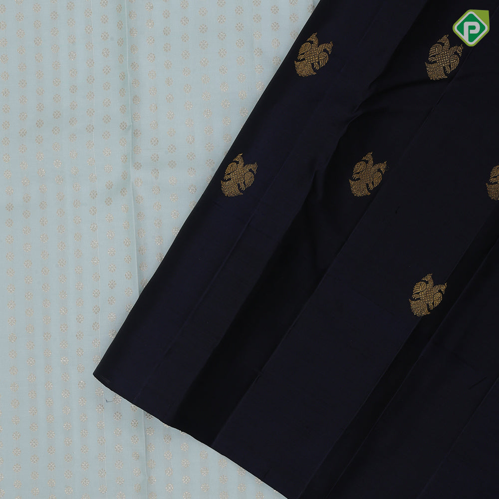 Pastel green silver zari thousand butta design contrast blue plain border bridal silk saree