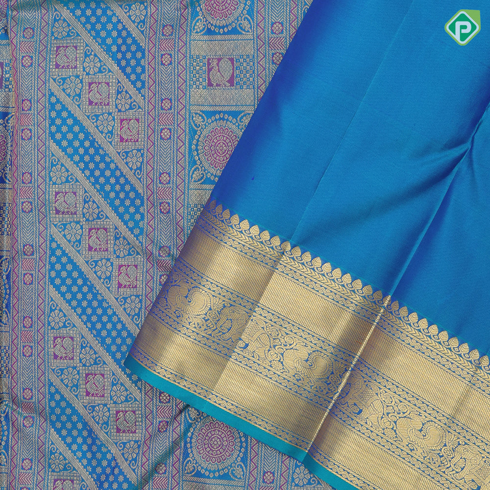Peacock green base gold zari and multi color multi design self gold zari multi design line border grand bridal silk saree