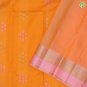 Fanta orange silver gold zari grouped butta design pale pink gold zari peacock and kamadhenu border organza silk saree