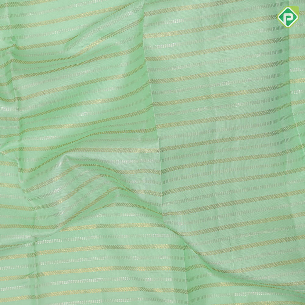 Pista green gold zari velthari lines design cobalt blue gold zari trendy floral rangoli design border fusion silk saree