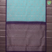 Sea green copper and silver zari gaja yaali kamadhenu butta royal blue spinning design border linen kora silk saree