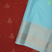Rust color gold zari stripes and flower creeper butta sea blue gold zari peacock butta border art silk saree