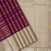 Purple base gold zari multi designed butta lines creamy sandal gold zari double peacock butta border bridal silk saree