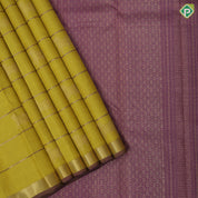 Lemon yellow gold zari Gomadha and zari lines self gold zari and purple edge border traditional silk saree