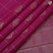 Rani pink gold zari double peacock deer round butta self gold zari flower and diamond border art silk saree