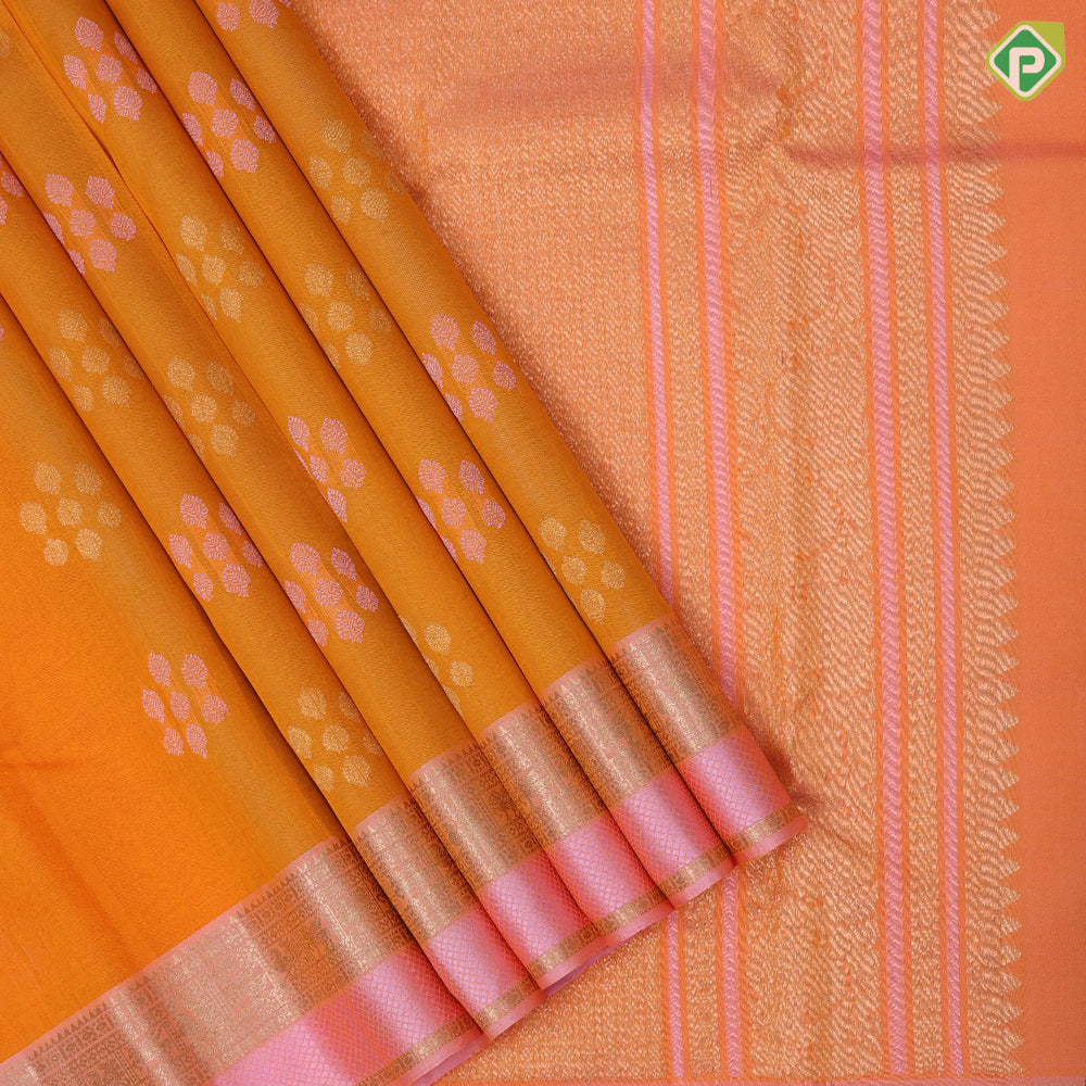 Fanta orange silver gold zari grouped butta design pale pink gold zari peacock and kamadhenu border organza silk saree