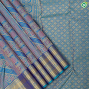 Peacock green base gold zari and multi color multi design self gold zari multi design line border grand bridal silk saree