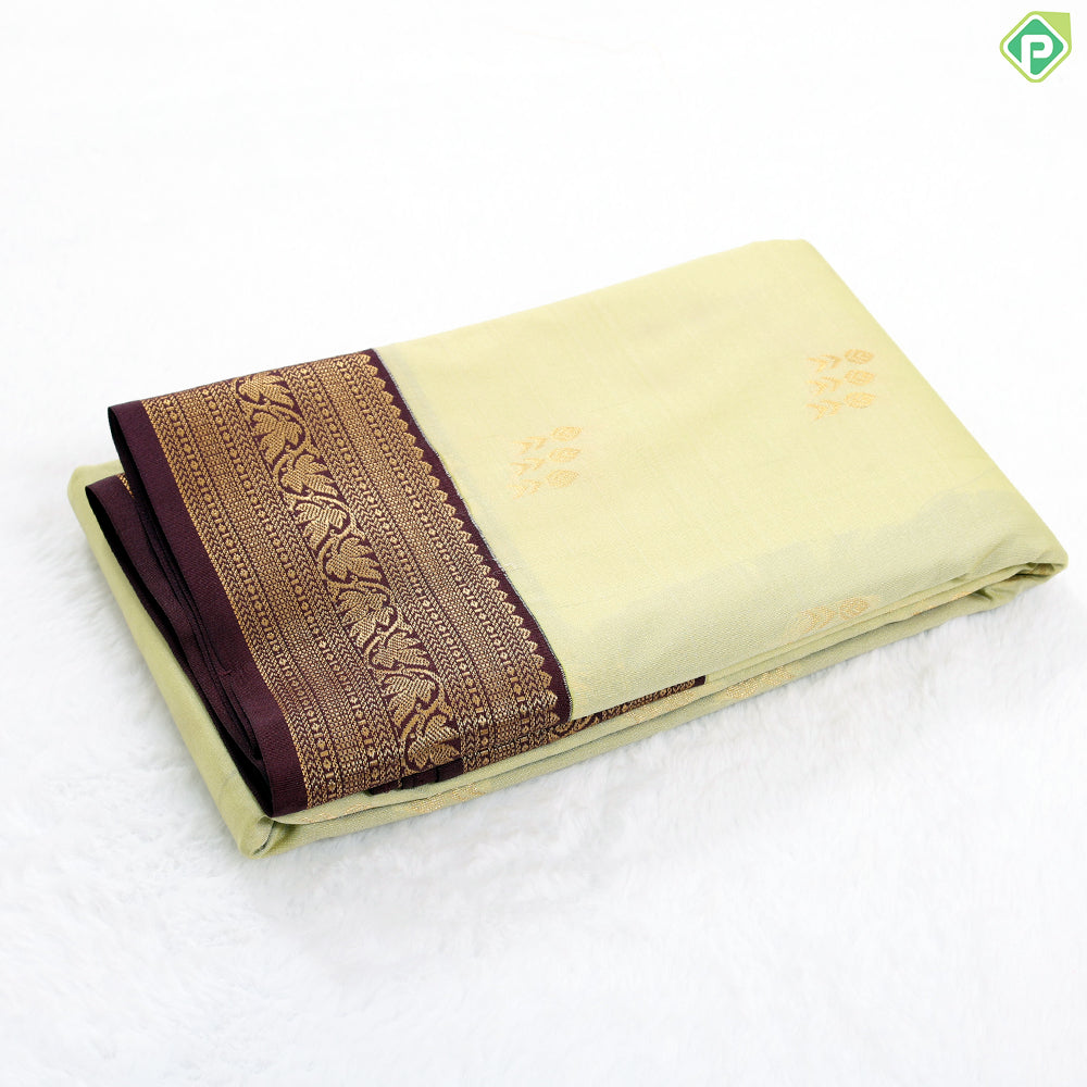 Spring green gold zari butta design contrast brown rangoli border gift saree