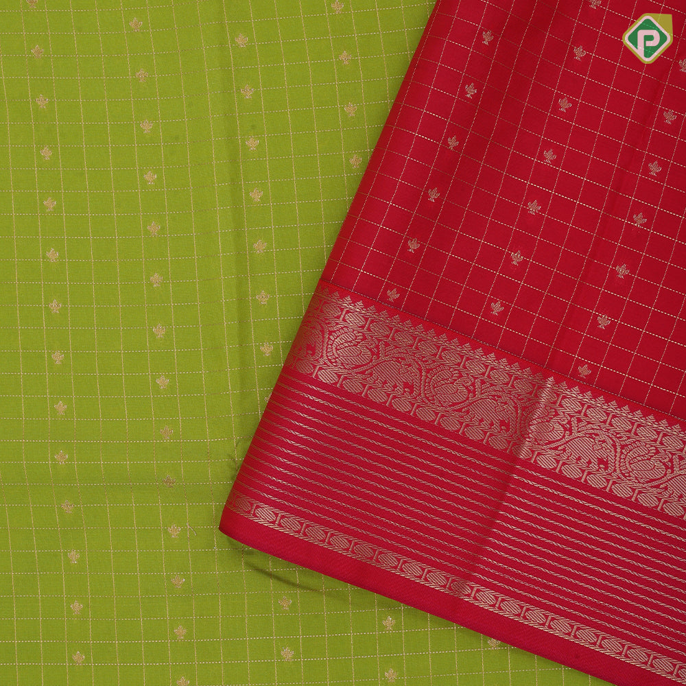 Parrot green gold zari checks and kamalam butta rani pink gold zari border art silk saree