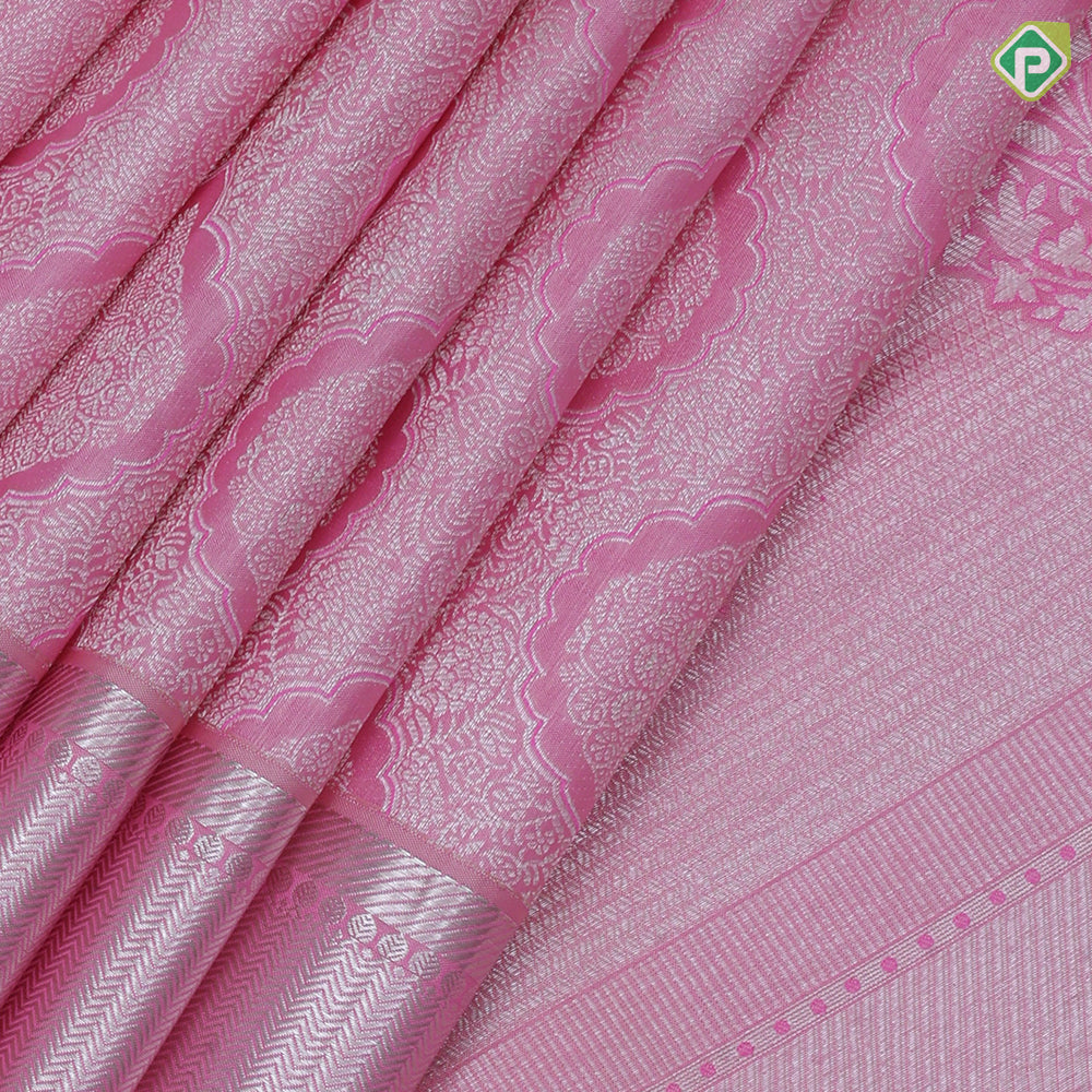 Pastel pink silver zari thilagam meena work butta self silver zari rangoli border bridal silk saree