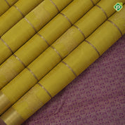 Lemon yellow gold zari Gomadha and zari lines self gold zari and purple edge border traditional silk saree