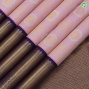Baby pink gold zari annam and round meena work butta checks purple blue gold zari cross lines border bridal silk saree