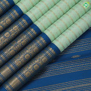 Pista green gold zari velthari lines design cobalt blue gold zari trendy floral rangoli design border fusion silk saree