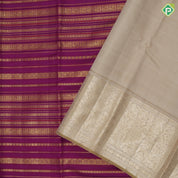 Purple base gold zari multi designed butta lines creamy sandal gold zari double peacock butta border bridal silk saree