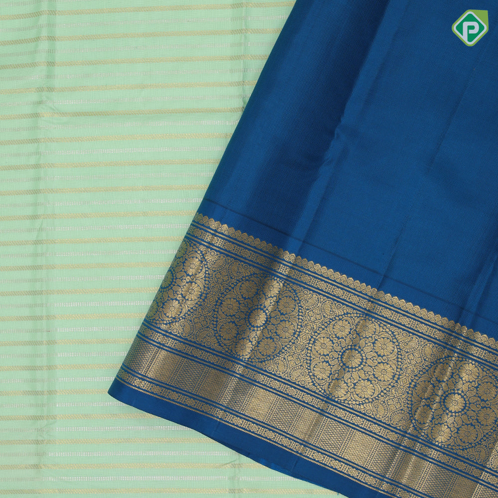 Pista green gold zari velthari lines design cobalt blue gold zari trendy floral rangoli design border fusion silk saree