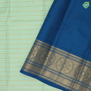 Pista green gold zari velthari lines design cobalt blue gold zari trendy floral rangoli design border fusion silk saree