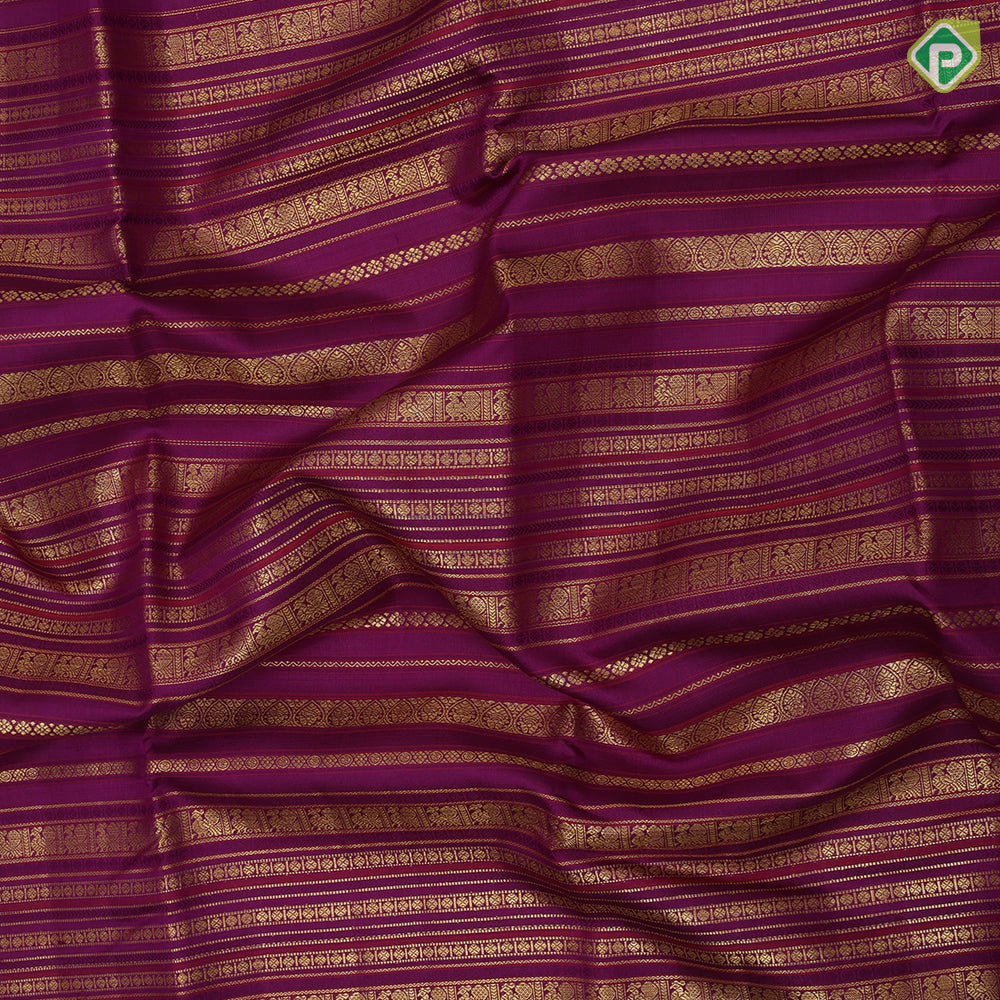 Purple base gold zari multi designed butta lines creamy sandal gold zari double peacock butta border bridal silk saree